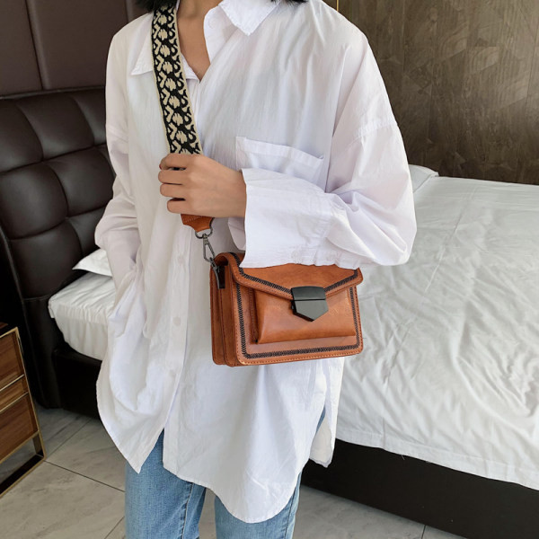 Ženska kožna torba sa tekstilnom ručkom - više boja