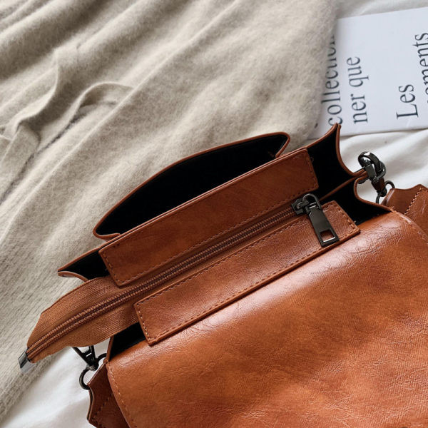 Ženska kožna torba sa tekstilnom ručkom - više boja