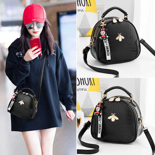 Ženska moderna torba sa metalnim elementom