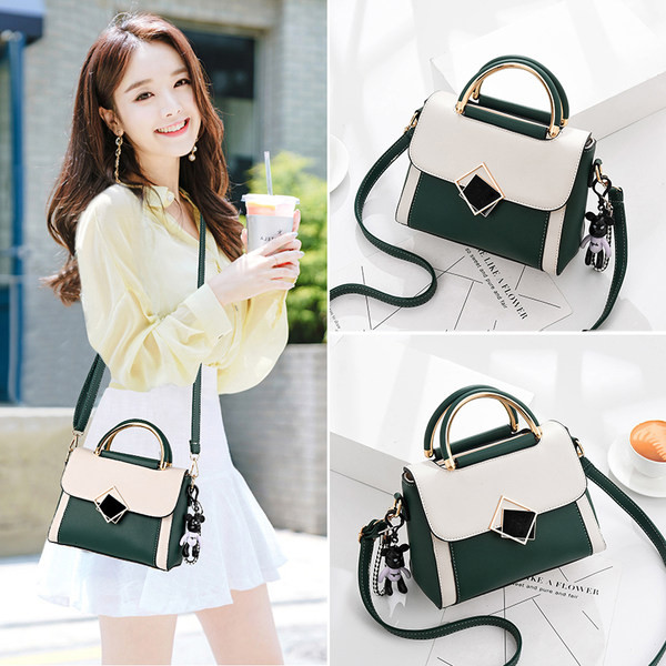 Ženska četvrtasta torba s kratkom i dugom ručkom i metalnim kopčanjem