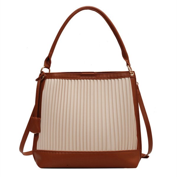 Ženska torba od eko kože i tekstila sa dugom ručkom