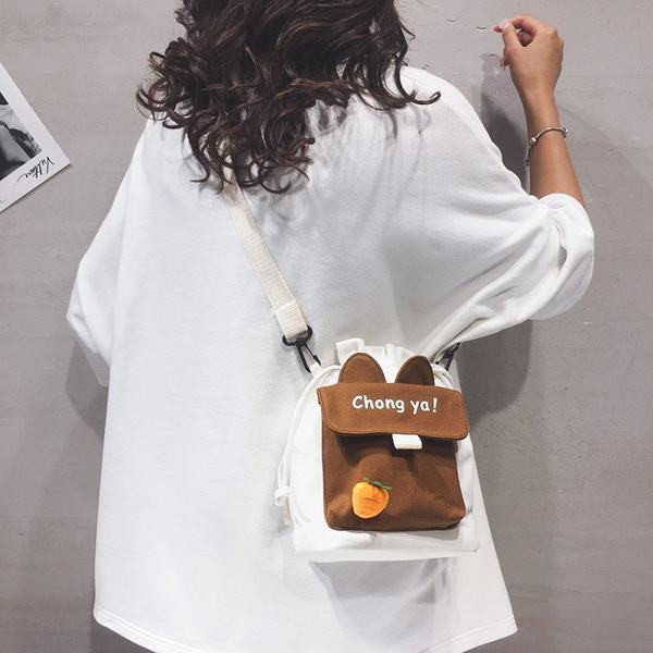 Ležerna ženska torba od tekstila s dugom podesivom ručkom