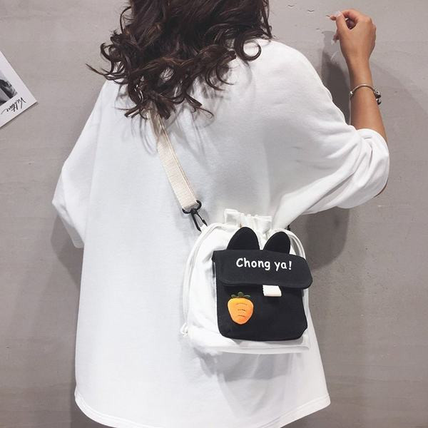 Ležerna ženska torba od tekstila s dugom podesivom ručkom