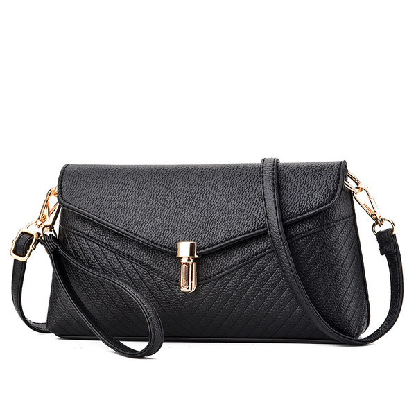 Ženska crna torba s kopčom