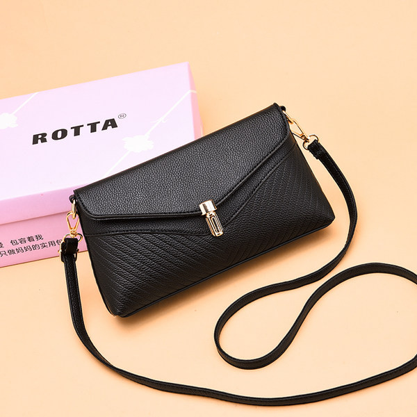 Ženska crna torba s kopčom