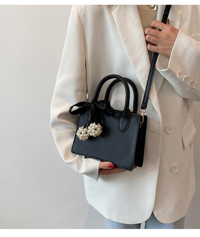 Ženska tvrda torba od eko kože sa dvije ručke