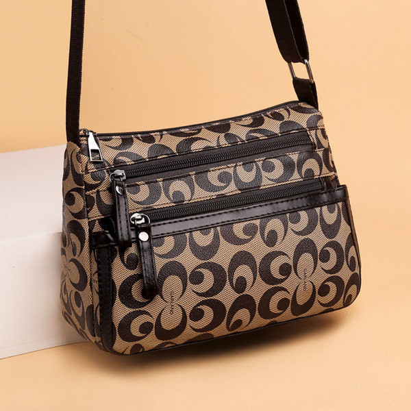 Дамска чанта с няколко отделения и дълга дръжка