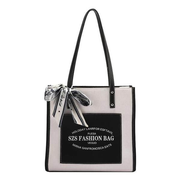 Velika ženska torba od platna sa natpisima i trakom