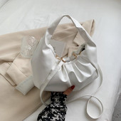 Μοντέρνα γυναικεία στρογγυλή τσάντα με κοντό και μακρύ χερούλι