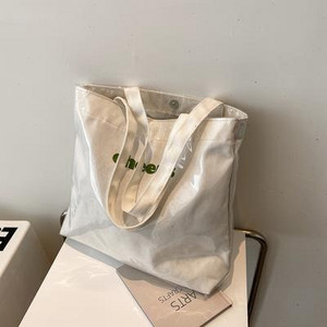 Μεγάλη πάνινη τσάντα με επιγραφή και μεταλλικό κούμπωμα