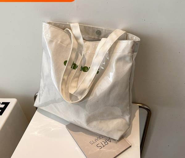 Μεγάλη πάνινη τσάντα με επιγραφή και μεταλλικό κούμπωμα