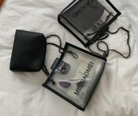 Διάφανη γυναικεία τσάντα με μεταλλική αλυσίδα