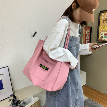 Дамска ежедневна чанта от текстил широк модел с джоб