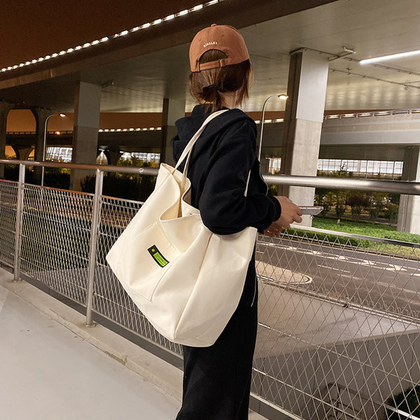 Γυναικεία casual υφασμάτινη τσάντα φαρδιά μοντέλο με τσέπη