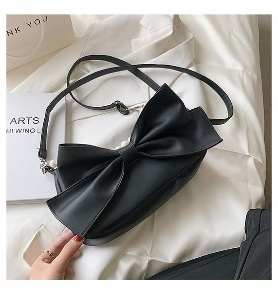 Стилна дамска чанта с панделка и декоративни перли