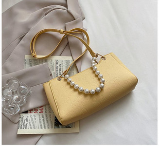 Μοντέρνα γυναικεία τσάντα από οικολογικό δέρμα με μαργαριταρένια αλυσίδα