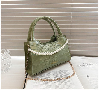 Κομψή γυναικεία τσάντα με διακοσμητικές πέρλες και μεταλλικό χερούλι