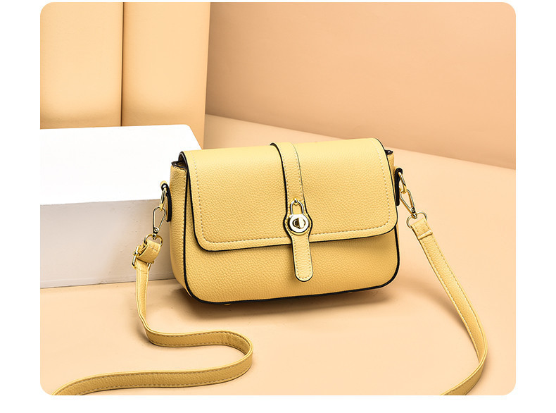 Стилна дамска чанта с катарама изчистен модел