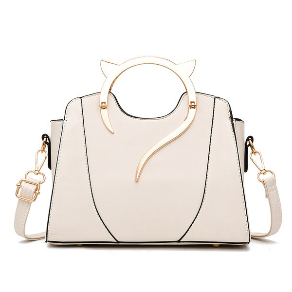 Κομψή γυναικεία τσάντα με μεταλλική λαβή σε σχήμα κεφαλιού γάτας