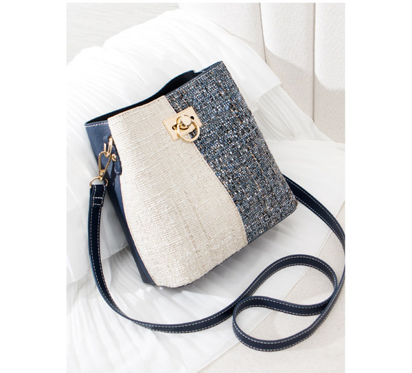 Elegantna ženska torba s dugom ručkom i kopčom