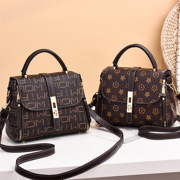 Γυναικεία κομψή τσάντα από τεχνητή τσάντα με κοντό χερούλι και μακριά λαβή ώμου