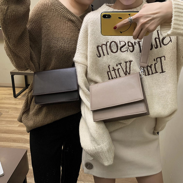 Μοντέρνα γυναικεία τσάντα από οικολογικό δέρμα με μακρύ ρυθμιζόμενο χερούλι