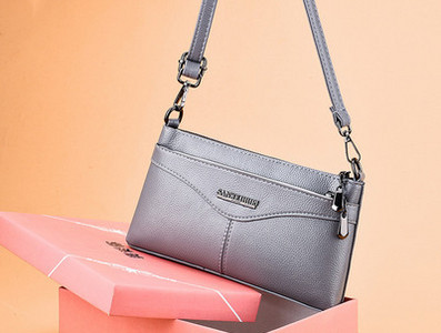 Νέο μοντέλο μικρή γυναικεία τσάντα από συνθετικό δέρμα στον ώμο