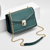 Elegantna kožna torba s kopčom