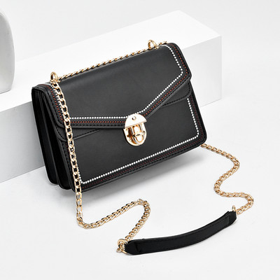 Elegantna kožna torba s kopčom