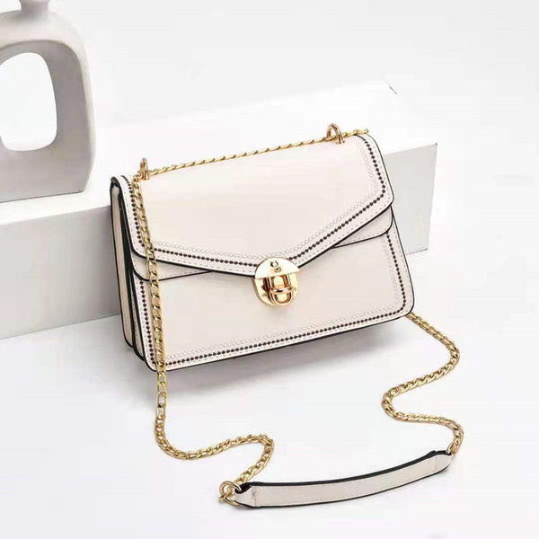 Elegantna kožna torba s kopčom