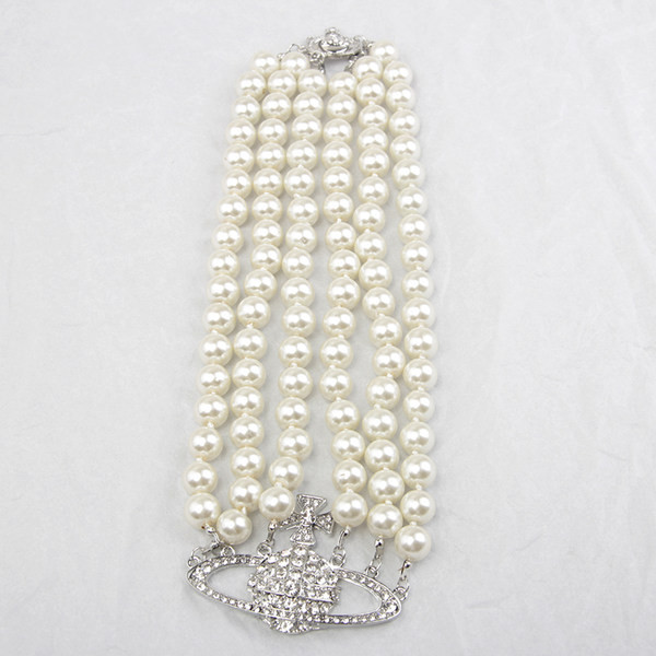 Дамска огърлица с перли и декоративни камъни