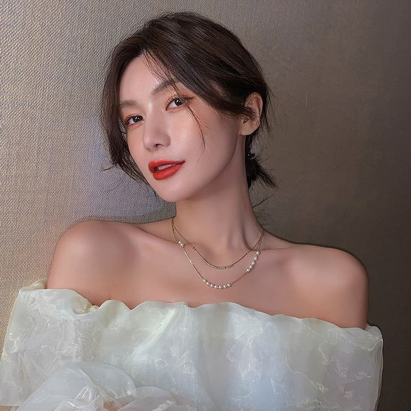 Стилно дамско двуредно колие с перли 