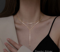 Μοντέρνο γυναικείο μενταγιόν δύο σειρών σε χρυσό χρώμα