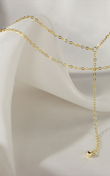 Μοντέρνο γυναικείο μενταγιόν δύο σειρών σε χρυσό χρώμα