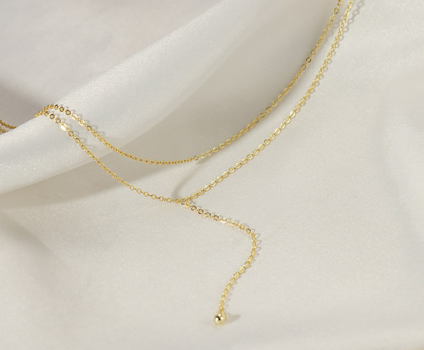 Μοντέρνο γυναικείο μενταγιόν δύο σειρών σε χρυσό χρώμα