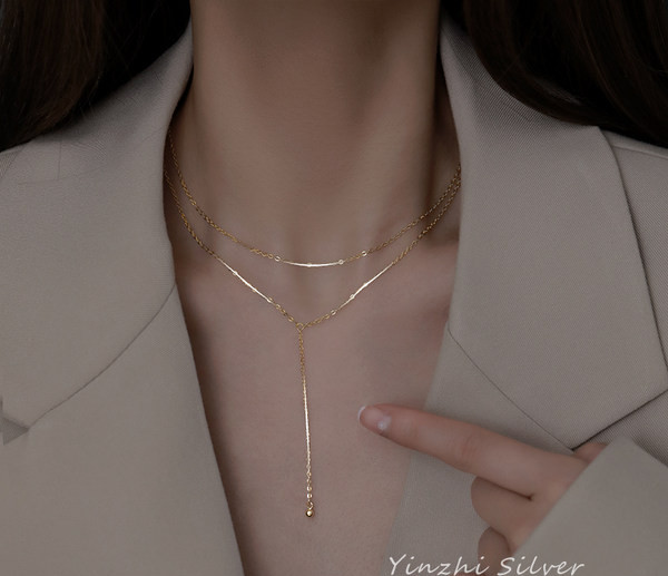 Μοντέρνο γυναικείο μενταγιόν δύο σειρών σε χρυσό χρώμα