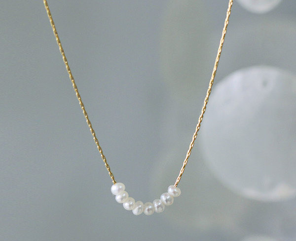 Χρυσό γυναικείο κολιέ με πέρλες