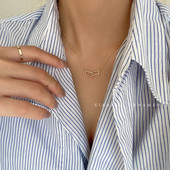 Moderan zlatni lančić s dvostrukim privjeskom