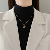 Γυναικείο κολιέ με στρογγυλό μενταγιόν σε χρυσό χρώμα