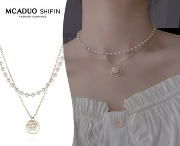 Γυναικείο κολιέ δύο σειρών με πέρλες