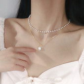 Κομψό γυναικείο κολιέ σε τρία μοντέλα με πέρλες