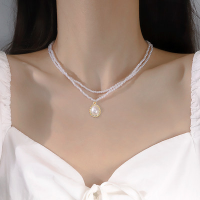 Κομψό γυναικείο κολιέ σε τρία μοντέλα με πέρλες