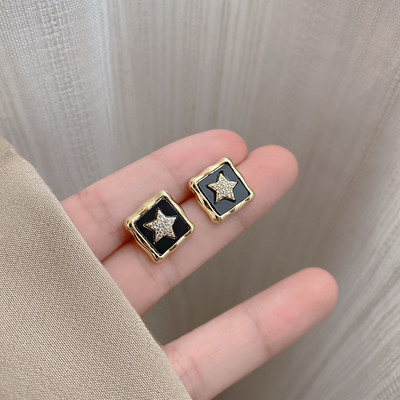 Γυναικεία σκουλαρίκια αστέρια με διακοσμητικές πέτρες