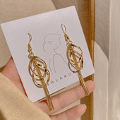 Ženske okrugle naušnice sa resama u zlatnoj boji