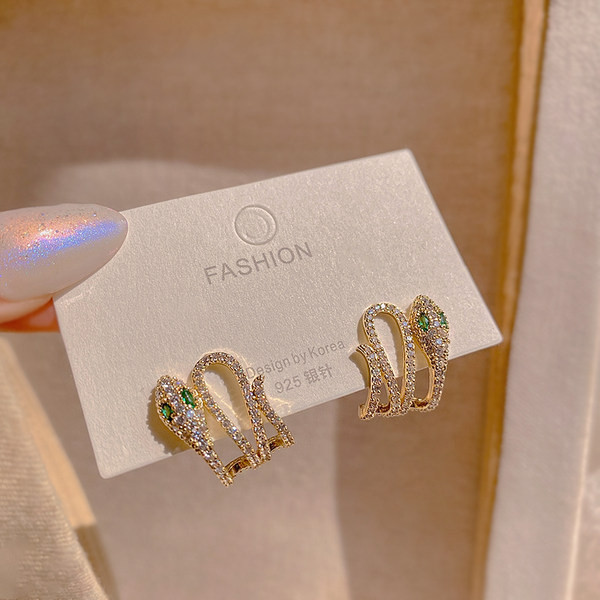 Ženske naušnice sa kamenčićima u obliku zmije