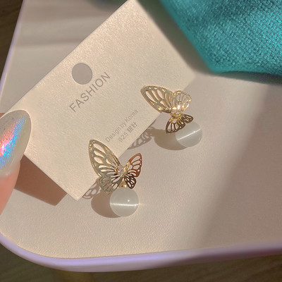 Γυναικεία σκουλαρίκια με πέρλα και πεταλούδα