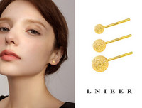 Γυναικεία χρυσά σκουλαρίκια σε στρογγυλό σχήμα