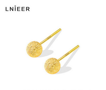 Γυναικεία χρυσά σκουλαρίκια σε στρογγυλό σχήμα