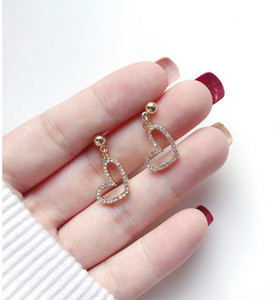 Σκουλαρίκια σε σχήμα καρδιάς με πέτρες