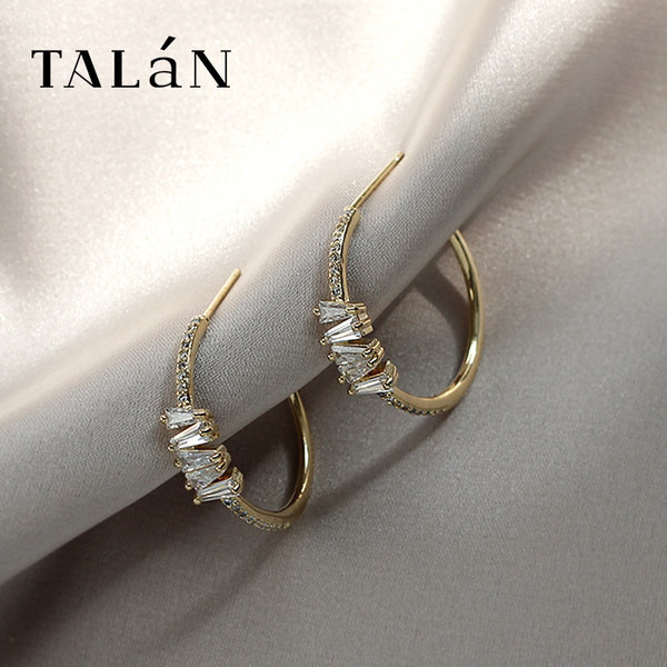 Ženske naušnice tipa prstenje s kamenčićima